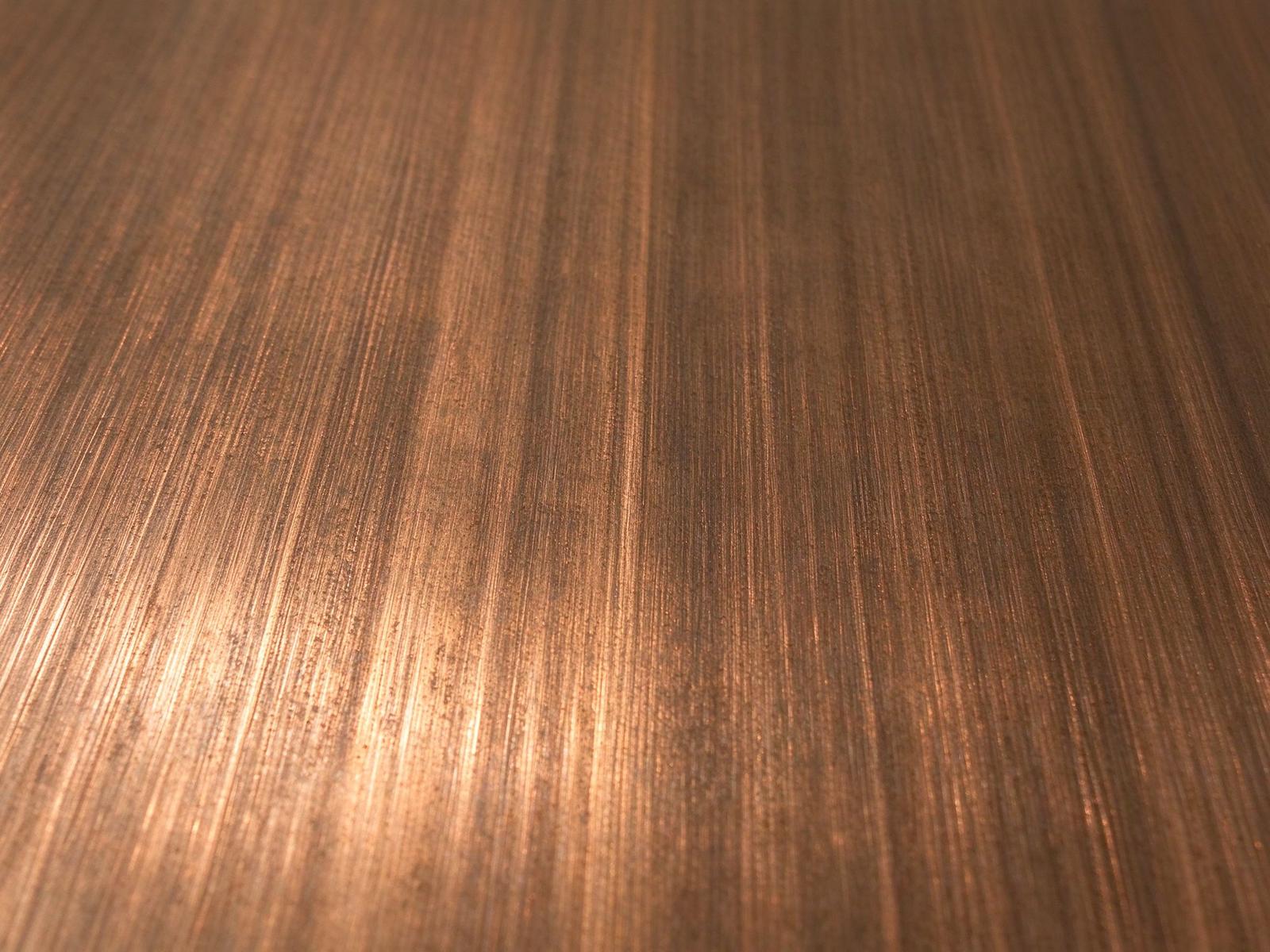 Antique copper stainless steel sheet surface texture close-up patina
