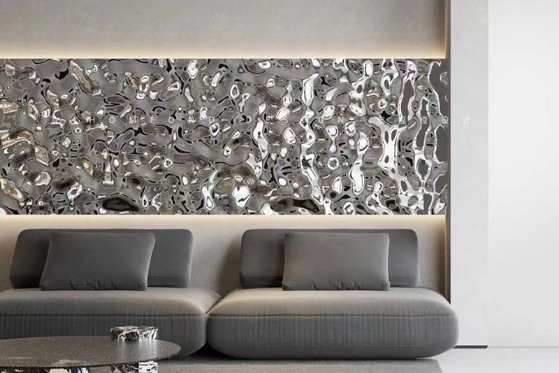Gold champagne water ripple wall panel in a luxury lounge, illuminated by recessed LED strip lighting